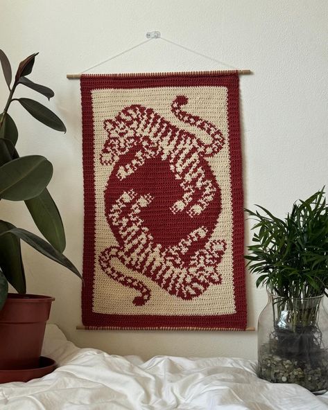 This product is a downloadable pattern for the Twin Tigers tapestry, no physical product is included. The image shown is a crochet piece, but this can also be used for knitting, cross stitch and other crafts. The PDF is a colour coded graph and it's 75x110 rows. The crochet sample I made ended up being 40x60cm. This pattern is for personal use only. 2 Colour Tapestry Crochet, How To Crochet Tapestry, Knit Tapestry Pattern, Tapestry Crochet Ideas, Crochet Picture Frame, Knit Tapestry, Crochet Tapestry Pattern, Crochet Mario, Intarsia Knitting Charts