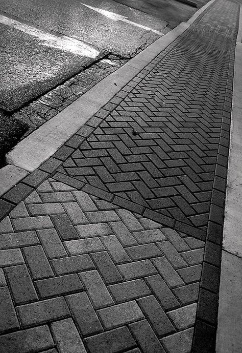 Black Walkway Pathways, Black Brick Walkway, Black Brick Patio Floor, Black Brick Pavers, Driveway Brick, Stamped Concrete Patio Designs, Brick Driveway, Pavement Design, Brick Patterns Patio