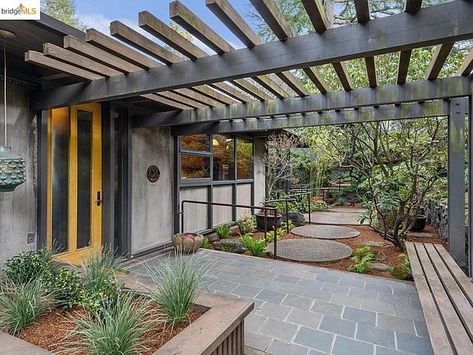 Earth Tone Palette, Yellow Front Doors, Japanese Style Garden, Japanese Garden Design, Open Dining Room, California Real Estate, Front Entrances, Gorgeous Gardens, Modern Homes