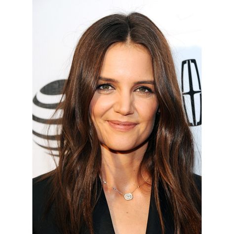 Katie Holmes “This warm golden brown color makes her skin glow and look sun kissed,” Tresch says about Katie Holmes’ hair color. Tresch, who describes this look as low maintenance, says it will require highlights about two to three times per year. “This look is subtle baby fine highlights that pop enough to show the movement of the haircut, but are toned down to only a few shades lighter than the natural color,” Tresch says. Katie Holmes Hair, Hair Color For Morena Skin, Baby Highlights, Balayage Hair Caramel, Hair Color For Fair Skin, Warm Hair Color, Olive Skin Tone, Long Brunette, Balayage Hair Dark