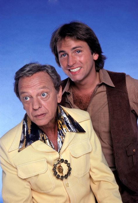 Ralph Furley [Don Knotts], roving bachelor and ridiculously clothed apartment landlord, meets his comedic match in pratfall-practicing Jack Tripper [John Ritter] in a promotional still for ABC’s “Three’s Company” circa 1982. #DonKnotts, #RalphFurley, #MrFurley, #MisterFurley, #ThreesCompany, #JackTripper, #1982, #JohnRitter, #comedy, #comedyduo, Threes Company, Gomer Pyle, Jim Nabors, Three’s Company, John Ritter, 80 Tv Shows, Don Knotts, Celebrities Who Died, Top Tv Shows