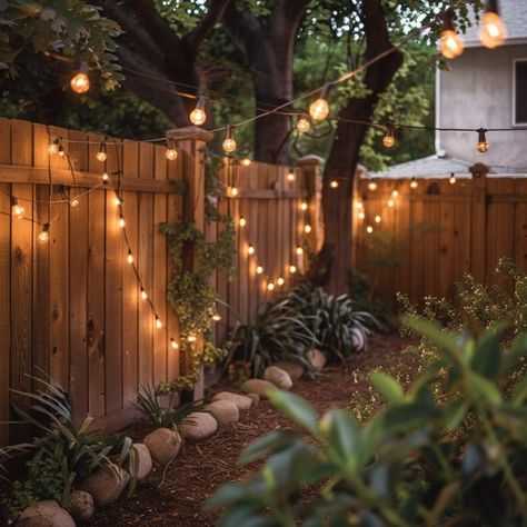 10 inventive fence decorating ideas Patio Fence Decorating Ideas, Wire Fence Decorating Ideas, Fence Decorating Ideas, Small Fence, Hanging String Lights, Simple Geometric Pattern, Patio Fence, Old Picture Frames, Bamboo Fence