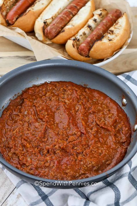 To enjoy this chili dog sauce at its finest, generously spoon it over your hot dog and garnish with chopped pickles and cheese. It's an effortless recipe that you can prepare in no time or store in the freezer for future use. With just ground beef, tomato sauce, and a blend of seasonings, you'll have a versatile and delightful condiment for any occasion! #chilisauce #hotdogchilisauce #condiment #hotdogchili #spendwithpennies Ground Beef Tomato Sauce, Pickles And Cheese, Beef Tomato Sauce, Chili Dog Sauce, Hot Dog Chili Sauce, Beef Tomato, Ground Beef Chili, Hot Dog Sauce, Beef Chili Recipe