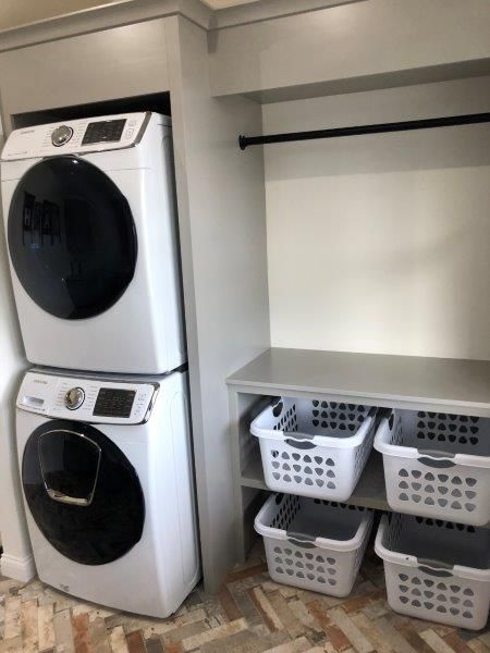 Stack Laundry Room Ideas, Laundry Stacked Washer Dryer, Laundry Room With Stacked Washer Dryer, Stacking Washer And Dryer Laundry Room, Laundry Room Ideas With Stackable Washer, Small Laundry Rooms Stacked Washer Dryer, Laundry Room Stacked Washer And Dryer, Laundry Room Ideas Stacked Washer Dryer, Stacked Laundry Room Ideas