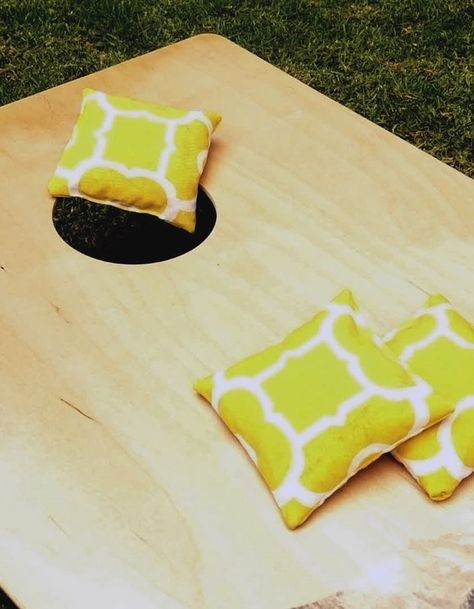 How to Make Cornhole Bags | eHow Mexican Kids Party, Mexican Games, Mexican Party Games, Diy Cornhole Bags, Diy Cornhole Game, Cornhole Scoreboard, Corn Hole Bean Bags, Regulation Cornhole Bags, Diy Cornhole