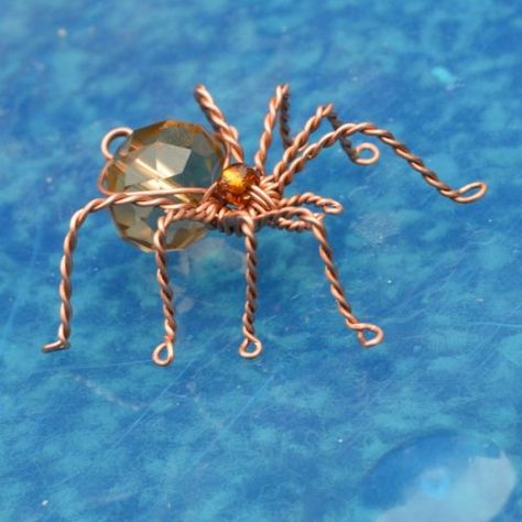 Deborah Kelly's Wire Spider Ornament | Holiday Designs Spider Jewelry Diy, Wire Spider Earrings, Wire Spider Necklace, Old Cd Crafts, Wire And Bead Insects, Wire Beaded Spider, Wire Spider, Copper Wire Crafts, Jewelry Making Patterns