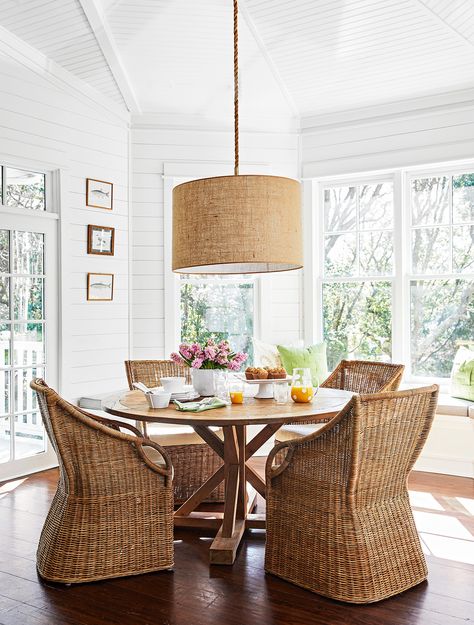 9 Ways to Decorate with Rattan for Gorgeous Natural Texture in Every Room Breakfast Nook Table, Breakfast Nook Ideas, Modern Farmhouse Dining Room, Nook Table, Modern Farmhouse Dining, Nook Ideas, Pendant Lighting Dining Room, Dining Room Light Fixtures, Wicker Chairs