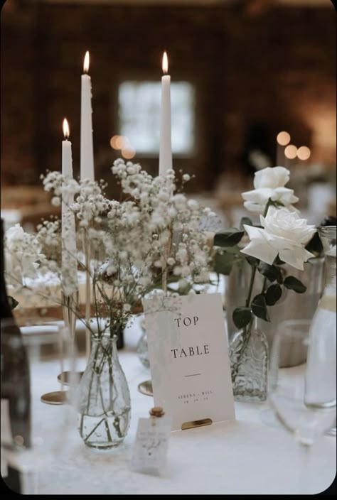 Cheap Beautiful Wedding Centerpieces, Long Table Wedding No Flowers, Wedding Table Vases Flowers, White Roses Dinner Table, Wedding Table Gypsophila, Only Candles Centerpiece, Top Table Gypsophila, Rose And Gypsophilia Centrepiece, White Flowers And Candles Wedding Decor