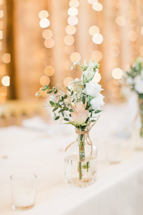 Top Table Flowers in Glass Jar | Photographer: Summer Lily Studio | Venue: Blake Hall | Dress: Lexi by Enzoani | Florist: The Flower Mill | Stationery: Pear Paper Co Wedding Top Table Flowers, Wedding Table Decorations Rustic, Table Decorations Rustic, Table Flowers Wedding, Top Table Flowers, Flowers Wedding Table, Wedding Top Table, Videography Wedding, Summer Wedding Decorations