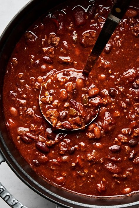 Beef, pork, three kinds of beans and spices galore make this hearty, stick-to-your-ribs chili your family’s new game day go-to. Chili With Beef And Pork, Dry Bean Chili, Best Beef Chili Recipe, Chili From Scratch, Best Beef Chili, Steak Chili Recipe, Beef Paprika, Award Winning Chili, Steak Chili