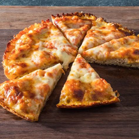 Cast Iron Pan Pizza | America's Test Kitchen Cast Iron Pan Pizza, Donut Toppings, Cookie Toppings, Crispy Cheese, America's Test Kitchen Recipes, Baking Stone, Favorite Pie, America's Test Kitchen, Cooks Illustrated