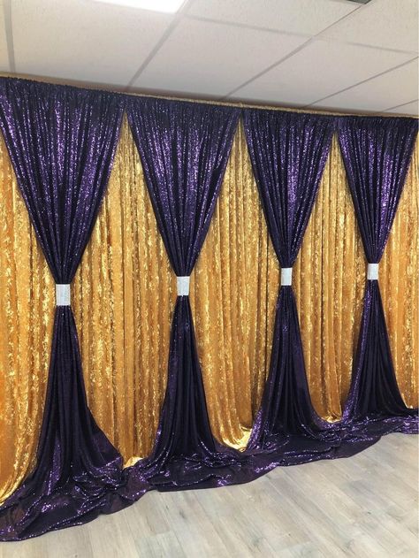 Gold ice velvet and purple sequins backdrop decoration available. 4 Gold velvet fabric (soft and heavy material) curtains ,each panel dimensions 60” wide X 9 feet high with 4” rod pockets plus 5 purple sequins panels, each panel dimensions 50”wide X 9 feet high with 4” rod pockets. 4 silver curtains tie ups included. Purple And Gold Curtains, Sequins Backdrop, Royal Blue Wedding Decorations, Adult Prom, Velvet Backdrop, Sequin Curtains, Silver Curtains, Blue Wedding Decorations, Sequin Wall