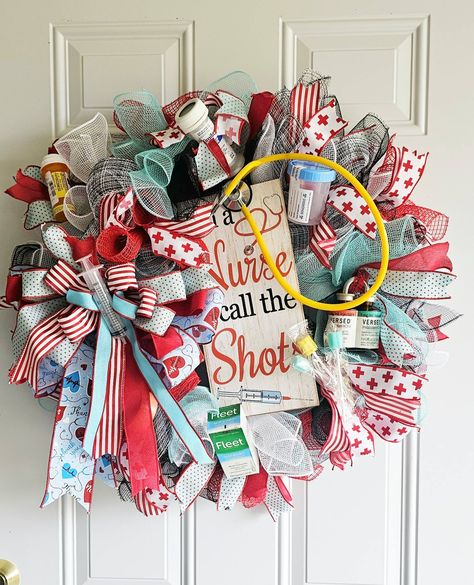 🌟🩺 Celebrate Nurses with Our Unique Handmade Nurse-Themed Wreath! 🩺🌟 Looking for a special gift for a nurse in your life or a unique addition to your home decor? Check out our handmade nurse-themed wreath! Featuring a vibrant mix of red, white, and teal ribbons, and accented with fun medical-themed decorations like syringes, pill bottles, and a stethoscope, this wreath is sure to make a statement. 🎁 Perfect for Nurse Appreciation or Graduation Gifts 🏡 Ideal for Front Doors, Offices, or Heal... Surgical Christmas Wreath, Nurse Door Sign, Miniature Medical, Nurse Crafts, Medical Accessories, Nursing Profession, Teal Ribbon, Themed Decorations, Nurse Graduation