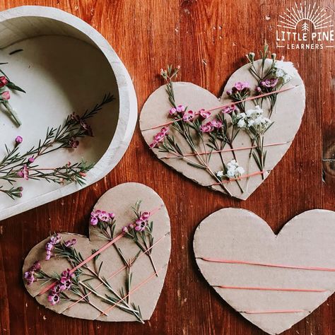 A Heart Nature Weaving Craft to Try Today Nature Inspired Valentine Crafts, Nature Rainbow Craft, Valentines Forest School Ideas, Nature Themed Valentines, Valentines Reggio Activities, Recycled Valentines Crafts, Valentine Nature Crafts, Waldorf Valentines Crafts, Cardboard Hearts Craft