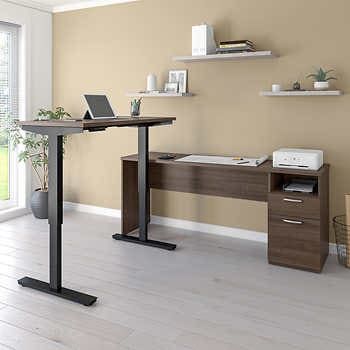 Upstand L-Shaped Electric Standing Desk by Bestar | Costco L Shape Standing Desk Office Layout, L Shaped Standing Desk, Standing Desk Setup Home Office, Standing Desk Office Layout, L Shaped Sit Stand Desk, Sit Stand Desk Home Office Layout, Sit Stand Desk L Shape, L Shape Height Adjustable Desk, Standing Desk Setup