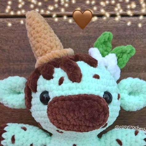 Tasha Gibbs on Instagram: "Introducing Minty the mint choc chip cow!  Minty will soon be joined by 2 other delicious ice cream flavours.... Can you guess which ones?!  Pattern by me and is coming soooooon so keep a look out for a tester call!!  . . . #crochet #crochetcow #amigurumi #amigurumicow #mintchocolatechip #icecream #patterndesigner #plushiesofinstagram #crochersofinstagram #crochetinspiration #fibreartist #crochetpattern #cowplushie #cutecow #smallbusinessuk #crochetbusiness" Mint Chocolate Chip Cow Crochet, Kawaii Cow Crochet Pattern, Cow Crochet Plushie Pattern, Crochet Brown Cow, Crochet Plushies Cow, Amigurumi Cow, Crochet Cow, Crochet Business, Crochet Food