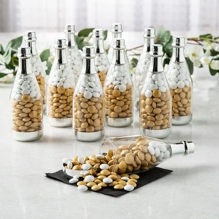 Decorate party tables at your big event or hand out small party favors (sold separately) with these champagne bottle containers.  Material: Plastic.  (4 dz./unit)  Size: 2" x 6" Champagne Centerpiece, Small Party Favors, Adult Birthday Party Favors, Best Champagne, Bottle Centerpieces, Party Favors For Adults, Bubble Party, Small Party, Wine Bottle Corks