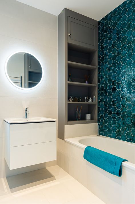 Bathroom furniture: Grey shelves fitted each end of the bath End Of Bath Shelves, End Of Bath Ideas, Bath With Shelves At End, Shelves At End Of Bath, Cupboards In Bathroom, End Of Bath Storage, Bespoke Bathroom Storage, End Of Bath Storage Ideas, Bathroom Alcove Ideas