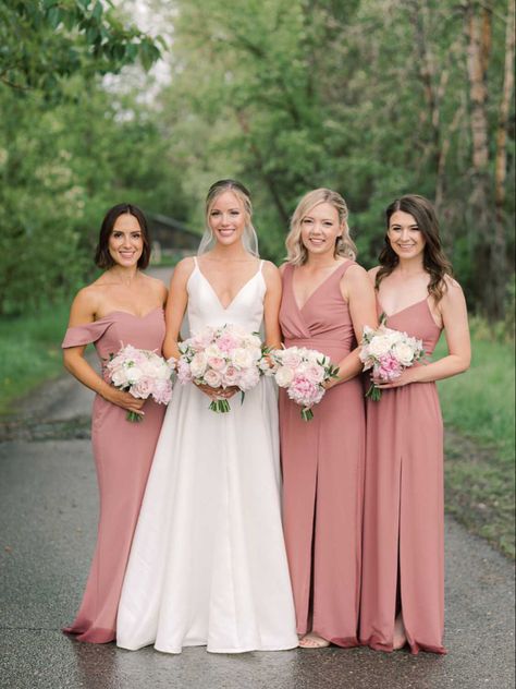 We love the dusty rose colour of these bridesmaid’s dresses and how perfect they look with the blush and white bouquets! The bouquets feature peonies, garden roses, sweet peas and ranunculus! 📷 @miltonphoto #dustyrosewedding #dustypink #bridesmaidsdresses #peonybouquets #whiteoharagardenroses #blushpeonies #peonywedding #calgary #calgarywedding #flowersbyjanie #springweddingdress #springwedding #junewedding Bridesmaid Dusty Rose Dresses, Peony Bridesmaid Dresses, Dusty Rose Dress Bridesmaid, Dusty Rose Bride Bouquet, Dusty Rose Pink Bridesmaid Dresses, Dusty Blush Bridesmaid Dresses, White And Blush Bridesmaid Bouquet, Dusty Pink Bridesmaid Dress, Blush Pink Bridesmaid Dresses Dusty Rose