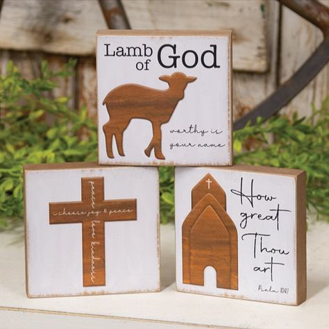 This assortment of 3 inspirational blocks features a wood-look graphic of a cross, church, or lamb and read, “Lamb of God, Worthy is your name,” “I choose joy & peace, peace love kindness,” or “How great Thou art.” Each freestanding sign is 4" square with a keyhole hanger on the back. Note: Item is sold in 3 assorted designs, not as a set. - Material: Wood - Size: 4" Sq. x 0.75" D - Color: White, Tan, Black Wooden Block Crafts, The Lamb Of God, Psalm 104, Wooden Church, Rustic Easter Decor, Rustic Easter, Wood Block Crafts, Lamb Of God, White Backgrounds