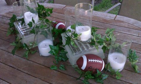 Are you ready for some football? Centerpiece by Details. Football Wedding Theme Centerpieces, Football Banquet Centerpieces, Football Centerpiece, Football Wedding Theme, Football Centerpieces, Nfl Wedding, Superbowl Party Food Ideas, Throwing A Football, Super Bowl Party Food