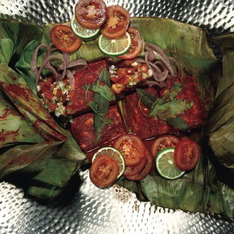 TikinxicYucatán's ubiquitous grilled fishgets a double wallop of flavor: first from a recado rojo (fire-red achiote marinade), then from a wrapping of banana leaves, which help keep the fish moist, prevent it from sticking to the grill, and add their own unique taste. Mahi Mahi Recipes, Grilled Mahi Mahi, Grilled Halibut, Fresh Orange Juice, Fresh Orange, Banana Leaves, Grilled Fish, Distilled White Vinegar, Dry White Wine