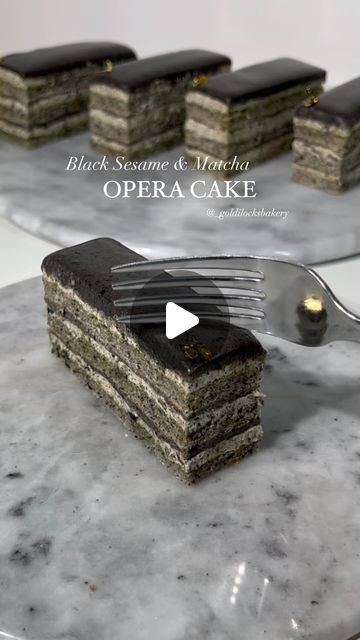 Goldilocks Bakery [Austin Bakery] on Instagram: "GF Black Sesame Matcha Opera Cake
- Black sesame almond joconde
- Black sesame buttercream
- black sesame ganache
- Japanese Matcha syrup

#blacksesameoperacake #blacksesame #blacksesamecake #austincakes #austinbakery #pastryartsmag #trendypastry" Matcha Syrup, Opera Cake, Japanese Matcha, Black Sesame, Syrup, Butter Cream, Matcha, Pastry, Opera