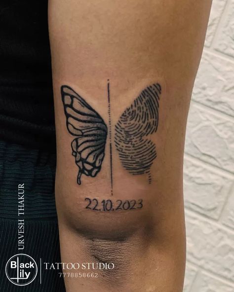 Customized Butterfly Fingerprint Tattoo The combination of butterfly and fingerprint signifies a merging of personal transformation or growth with individual identity. The birthdate adds a personal touch, representing an important milestone or a significant event in the person's life. #buterfly #buterflytattoo #fingerprint #fingerprinttattoo #tattoo #tattoolover #tattoos #tattoo #blacklily_tattoo #halol #vadodara #bhavnagar #gujrat Butterfly Thumbprint Tattoo, Tattoos With Fingerprints, Thumbprint Memorial Tattoo, Butterfly Fingerprint Tattoo, Finger Print Tattoo Memorial, Thumbprint Tattoo Memory, Fingerprint Tattoo Memorial, Fingerprint Tattoo Ideas Unique, Butterfly Fingerprint