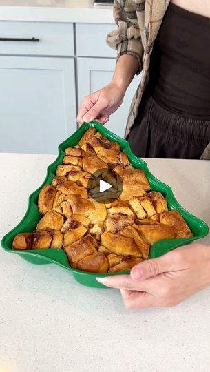 Easy holiday breakfast | breakfast, cinnamon roll, Rick Lax, casserole | Easy holiday breakfast

Woman makes a cinnamon roll casserole in the shape of a christmas tree.

This original video was produced by Network Media, Rick... | By Life with Coco | Okay. These are just our
cinnamon roll grams. Mm. Lots of grams. Open up one more
package so we can really fill up our Christmas tent. Save the icing for later. Quickly just cut these into
your fourths. So two quick cuts. Fill up your pan. You can
do this in a regular pan if you don't have a Christmas tree pan
but I wanted a festive Christmas breakfast. I love
that. It's definitely one of those little touches that kind
of makes a difference. Yeah right? It makes it fun for any
party or if you have like a slumber party or something like
that wi Cinnamon Roll Christmas Tree Breakfast, Christmas Tree Shaped Cinnamon Rolls, Breakfast Cinnamon Roll Casserole, Christmas Tree Breakfast, Cinnamon Roll Christmas Tree, Christmas Tent, Life With Coco, Justine Kameron, Breakfast Cinnamon