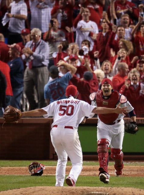 St. Louis Cardinals starting pitcher Adam Wainwright and St. Louis Cardinals catcher Yadier Molina celebrate the Cardinals series clinching ... Stl Cardinals Baseball, Adam Wainwright, Cardinals Players, St Louis Cardinals Baseball, Fantasy Baseball, Yadier Molina, Stl Cardinals, Cardinals Baseball, National League