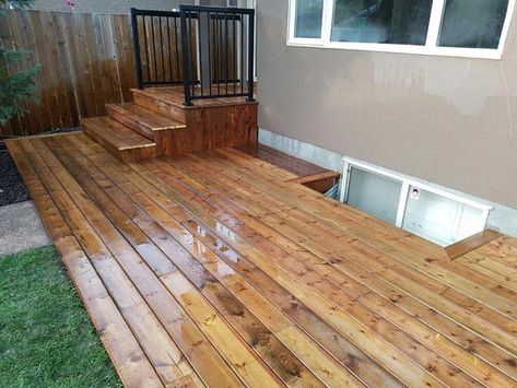 Floating Deck With Stairs, Small Ground Level Deck Ideas, Floating Deck Ideas Ground Level, Townhouse Deck Ideas, Ground Level Deck Plans, Deck Vs Patio, Deck Alternatives, Deck Cable Railing, Lakehouse Exterior