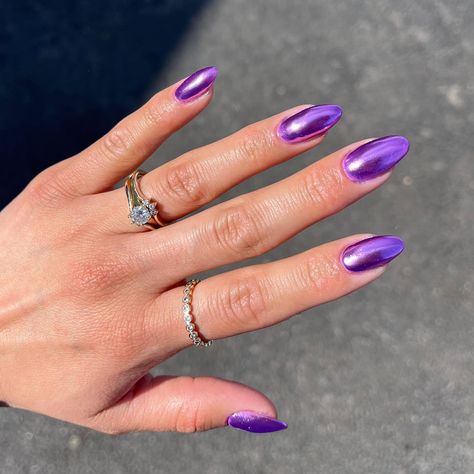 Posted by Zoe Scott: Today, we're diving into the world of dark purple nails with that irresistible glittery twist. It's a trend that's been catching eyes left and right, ... Purple Nails Glitter, Purple Chrome Nails, Acrylic Nail Designs Coffin, Dark Purple Nails, Purple Chrome, Purple Ombre Nails, Hoco Nails, Purple Glitter Nails, Chrome Nails Designs