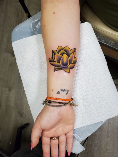 Purple and Yellow forearm lotus flower tattoo Lotis Tattoo, Chrysanthemum Flower Tattoo, Small Lotus Flower Tattoo, Lotus Flower Tattoo Meaning, Yellow Tattoo, Lotus Flower Meaning, Lotus Mandala Tattoo, Small Lotus Tattoo, Indie Tattoo