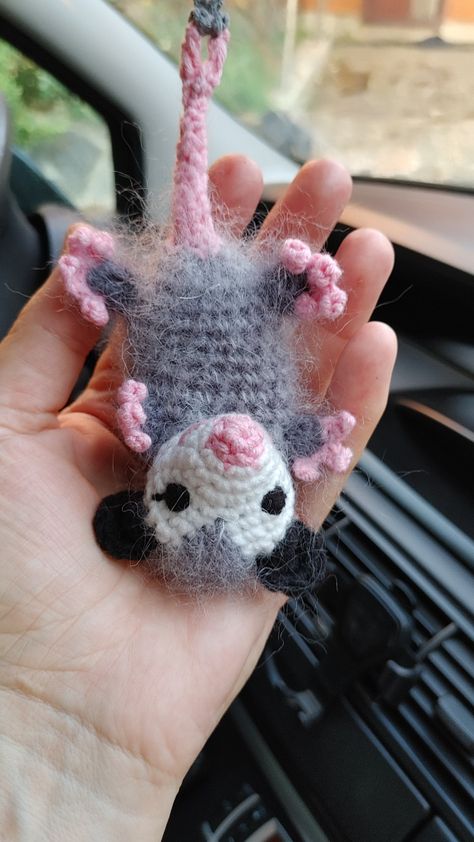 Opossum hanging upside down. Knitted decor in the car. The American marsupial possum. Decoration on the rearview mirror. Charm toy in the car. Gray possum hanging accessory. Gift for a new driver. Cute stuffed animal for women. Excellent gift for a new driver, for a birthday, for her, for him, for a friend, opossum lover, for decorating a car mirror, for decorating a car interior, soft decor, a souvenir, a gift for a farmer, a keepsake for a pet. Keychain for laughter.  Price for one toy  Packag Amigurumi Possum Free Pattern, Knit Car Accessories, Possum Stuffed Animal, Possum Birthday Party, Birthday Gifts Crochet, Stuffed Animal Mirror, Opossum Jewelry, Opposum Crochet, Possum Birthday