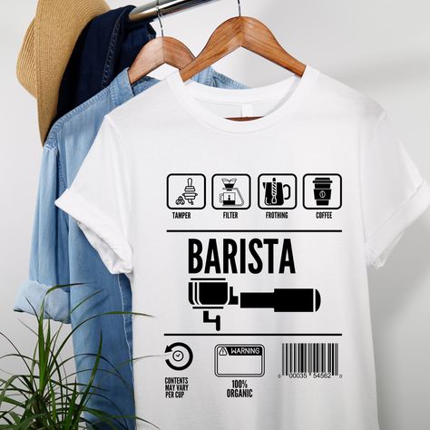 Introducing our new Barista T-shirt! Perfectly designed for those who love coffee and make it with passion. Featuring a quirky and fun graphic, this T-shirt is made with premium quality cotton, ensuring maximum comfort for all-day wear. Whether you're behind the counter or simply out and about, this T-shirt will scream your love for coffee and unparalleled brew-making expertise. Get ready to impress your customers and flaunt your skills in style! Order now and add a touch of personality to your Barista T Shirt, T Shirt Coffee Design, Coffee Shop Tshirt Design, Barista Uniform Coffee Shop, Coffee Shop Shirt Design, Coffee Graphics Design, Coffee Shop Uniform, Coffee Shop Merch, Coffee T Shirt Design