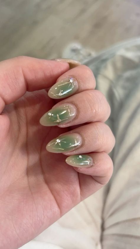 Green Nails Gel Polish, Emerald Green Nails With Gold Accent, Sage Green Korean Nails, Green Star Nails Acrylic, Fairy Aesthetic Nails Green, Sparkle Nails Green, Sage Green Fairy Nails, Sage Jelly Nails, Fairy Grunge Nail Ideas