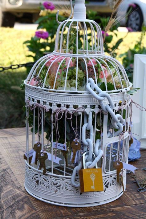 Birdcage love lock bouquet toss alternative                                                                                                                                                                                 More Bouquet Toss Alternative, Alternative Bouquet Toss, Key Themed Weddings, Wedding Bouquet Toss, Pretty Wedding Rings, Wedding Birdcage, Love Lock, Bouquet Toss, Offbeat Bride