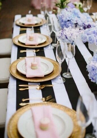 Decorate your bridal shower party tables with phenomenal allure using black and white striped satin rectangular tablecloths. Place lush green faux plants and chic lavender silk rose flower bouquets on the table to elevate the decor. Complete the tablescape with impeccable beauty by including gold acrylic charger plates, white plastic salad plates, blush linen napkins and heavy duty gold cutlery in your place settings to create an awe-inspiring table setup for your bridal shower party. Wedding Planning Pictures, Black And White Tablecloth, Striped Tablecloth, Fiesta Table, Kate Spade Wedding, Mexican Table Runner, Mini Plates, Preppy Wedding, Aisle Runners