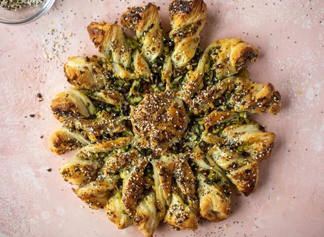 There are many impressively flaky things you can make with store-bought puff pastry —here are our favorite recipes for tarts, hand-pies, and cheese sticks. Spinach Artichoke Puff Pastry, Artichoke Puff Pastry, Pastry Twists, Puff Pastry Twists, Lox And Bagels, Whats Gaby Cooking, Party Snack Food, Eat This Not That, Foodie Crush