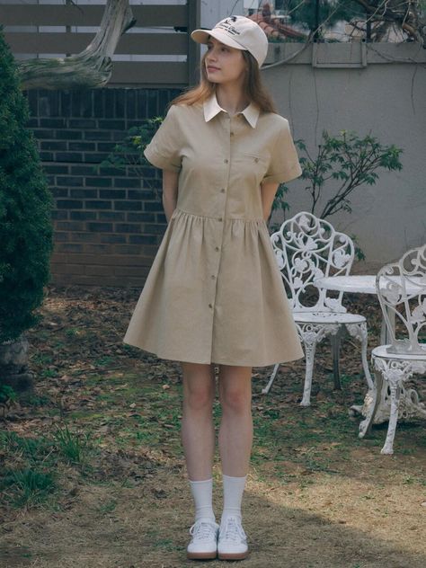 It's easy to wear, comfortable and looks good with just about everything.Softly structured, this effortless shirt dress.It is exceptionally soft and durable. - Short sleeve mini dress- Shirred waist and rolled cuffs - Standard collar and front pocket with button- This dress with the perfect pop of pretty- follows your contours with a little room Casual Beige Collared Mini Dress, Spring Button-up Everyday Dresses, Beige Short Sleeve Mini Dress For Fall, Classic Short Sleeve Mini Dress For Spring, Relaxed Fit Knee-length Mini Dress For Work, Beige Mini Dress With Short Sleeves For Fall, Classic Mini Length Shirt Dress For Day Out, Beige Relaxed Fit Casual Shirt Dress, Casual Beige Shirt Dress With Relaxed Fit