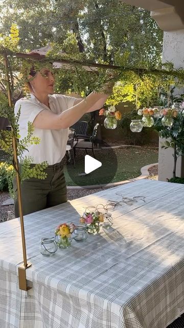 11K comments | Jennifer /Stylist /Home, Flowers, Tables 🌸🍃 on Instagram: "I bought this over the table rod last Fall and have greatly enjoyed styling it through the seasons. It’s such a fun way to elevate a dining experience by allowing endless creative possibilities!

I found these cute little hanging jars which are perfect for little florals, tea lights, a goldfish….🤭(please don’t)

Comment LINK for links to the rod and accessories to be sent to your inbox. 

🤗Facebook friends: Here’s the link 
https://liketk.it/4zNOz

PS: Stay tuned for the rest of my Easter table on Monday! 🐇🌸🍃

#springhomedecor #springtablescape #tabletopdecor #springtabledecor #Eastertable #alfrescodining #flowers #ltkhome #ltkspring #ltkit 

Over the table rod accessories" Hanging Decor Over Table, Table Rod Decoration, Table Rod Stand Decor, Hanging Table Decorations, Table Rod Decoration Ideas, Over Table Rod Decor, Over The Table Rod Diy, Over Table Rod, Over Table Hanging Decorations