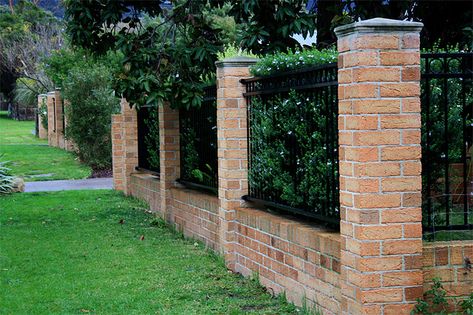 Brick fence by Robert Wojciechowski, via Flickr Brick Perimeter Wall, Italian Fence Ideas, Wood And Brick Fence, Fencing On Top Of Brick Wall, Brick And Wood Fence, Brick Privacy Fence, Metal Fence Ideas Steel, Metal Fence Ideas, Brick Wall Gardens