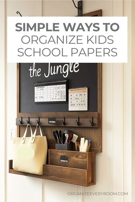 A family command center hanging on the wall. The command center consists of a chalkboard, a calendar, hooks, and two slots for filing paper and pens. Organize Kids School Papers, Kids School Papers, Diy Storage Solutions, Organize Kids, Event Programs, Hanging Folders, School Paper, Paper Clutter, Digital Organization