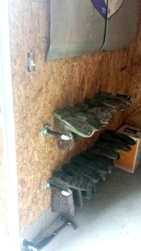 Boot rack for garage Garage Boot Rack, Boot Hangers Diy, Corrugated Metal Wall, Boot Hanger, Water Boots, Chicken Houses, Ranch Boots, Boot Organization, Furniture Remodeling