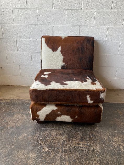 "Genuine Cowhide front, sides and back. 36H X 28W X 40D. Seat Height is 18\".  Depending on availability. After your purchase we send numbered images for you to select from. If your serious, read my feedback on Houzz or ask for references and pull the trigger. This product is 50-70% less than in stores. Its a great price and product. We are unable to offer custom or modifications.  Please contact me for available hide selection and quantity. Please include contact number with the order for delivery!  John  214.616.6369 *Cowhide Dining Chair | Cowhide Chair | Cowhide Chairs | Genuine Leather | Hand Distress Solid Wood Frame | Brass Nails  #cowhidearmchair #westernchair #leatherchair #interior #interiordesign #design #southwest #santafedesign #newmexico #scottsdale #fortworth #texas #santafe Cow Hide Living Room Decor, Southwestern Interior Design Living Room, Cowhide Aesthetic, Cow Hide Furniture, Bar Lounge Seating, Cowboy Furniture, Cowhide Chairs, Cowhide Bar Stools, Fortworth Texas