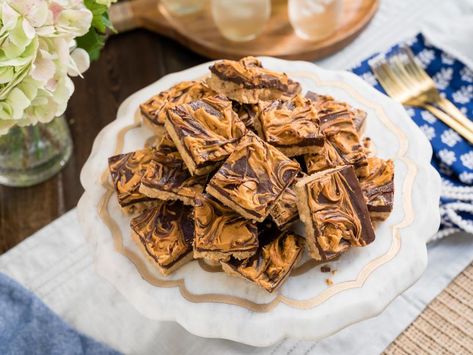 Peanut Butter Incredibles Recipe | Martina McBride | Food Network Oatmeal Biscuits, Peanut Butter Squares, Chocolate No Bake Cookies, Martina Mcbride, Chunky Peanut Butter, Butter Bars, Butter Recipes, Baking Recipes Cookies, Peanut Butter Bars