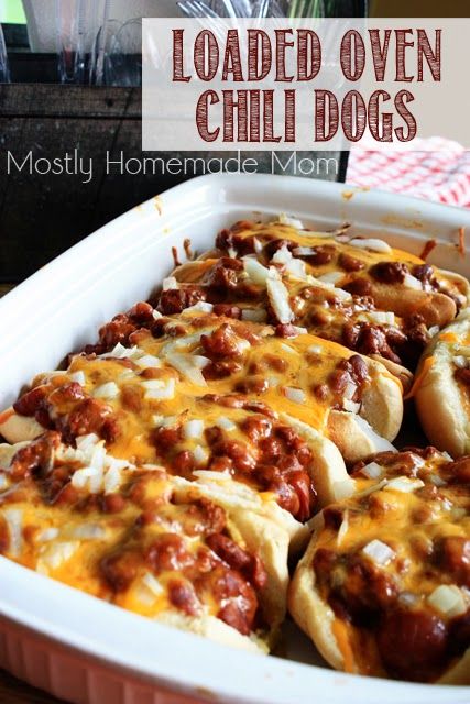 Mostly Homemade Mom: Loaded Oven Chili Dogs Such a great way to cook hotdogs, I also wrapped mine in uncooked bacon so that I could have that extra yumminess, plus only made 4 hotdogs which came out awesome!  The only problem is trying to make these for one person, could probably skip the chili or try finding a smaller can so the extra doesn't get wasted...but otherwise epic meal plan especially for a lazy saturday:) Chili Dogs, Hot Dog Recipes, Cooking For A Crowd, Football Food, Corn Dogs, Dog Recipes, Naan, Main Meals, Main Dish Recipes