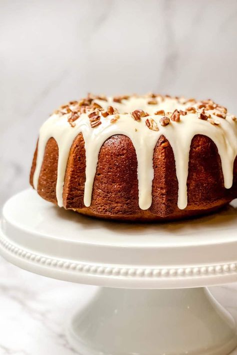 Hummingbird Cake is a moist and dense cake filled with ripe bananas, pineapple, pecans, and deliciously savory spices. Tweaked slightly from the original, this cake is simplified and made even easier in a Bundt pan. And, of course, drizzled in a thick cream cheese glaze for the ultimate in flavor. Dense Cake, Easy Bundt Cake Recipes, Hummingbird Cake Recipes, Easy Bundt Cake, 31 Daily, Easy Sweets, Bundt Cake Recipe, Hummingbird Cake, Cream Cheese Glaze