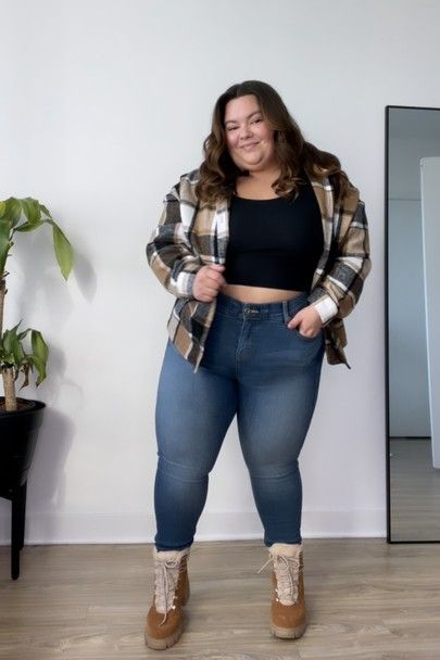 Petite plus size fashion blogger Natalie in the City wears a cute fall outfit with a plaid shacket from Shein, jeans from Torrid, lugg boots from Walmart, and a crop top from Adore Me. #LTKshoecrush #LTKSeasonal #LTKcurves Plus Size Plaid Shirt Outfit, Plus Size Flannels, Flannel Shirt Plus Size, Petite Plus Size Fashion, Plaid Shirt Plus Size, Torrid Outfits, Torrid Outfits 2022 Fall, Shein Jeans, Petite Plus Size