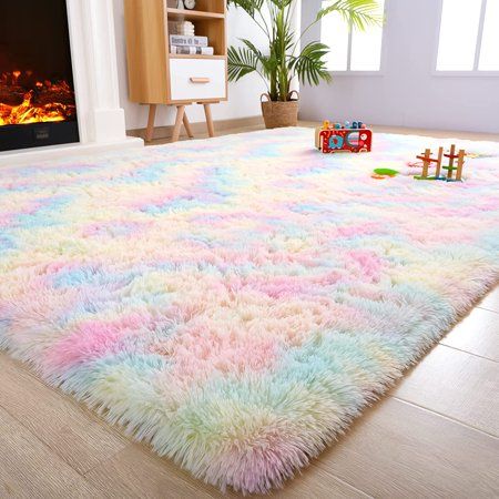 LOCHAS modern indoor rug is designed for luxurious feeling and comfort. Soft to the touch, warm and beautiful, not shed and not fade, skinfriendly. LOCHAS fluffy rug features a luxurious, soft high pile velvet and sponge middle layer that gives you a best touch feeling and shields toes from the cold floor. Size: 5' x 8'.  Color: Multicolor. Rainbow Rugs, Girls Room Rugs, Rainbow Bedroom, Unicorn Room Decor, Fuzzy Rug, Teenage Room, Colorful Area Rug, Rainbow Rug